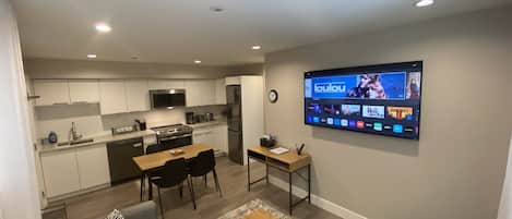 Living room with 65" smart TV