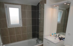 Prepare for your day outside in the spacious bathroom.