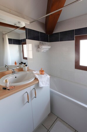 Freshen up in the bathroom after a day of adventure.