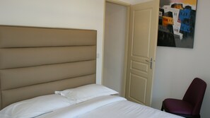 Get a peaceful night sleep in our cozy bedroom.