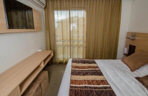 Relax on the comfy bed after a day outside.