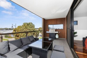 Relaxing outdoor entertaining on balcony