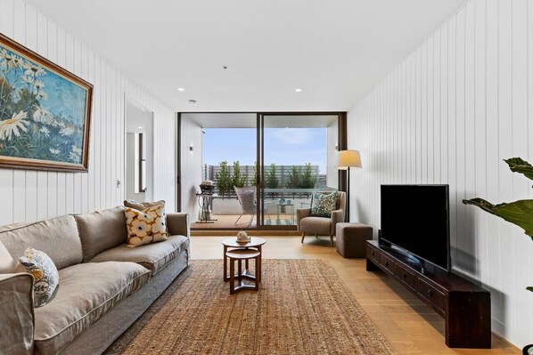 Living opens to the balcony and sea breezes