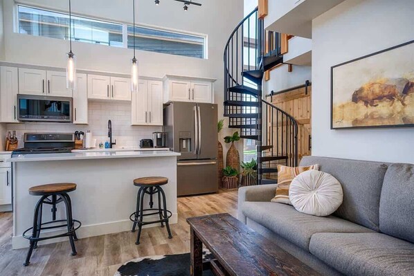Home interior with fully equipped kitchen.