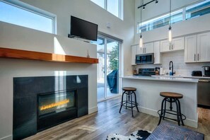 Home interior with fully equipped kitchen.