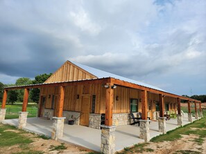 Cabana Building.  2 Shared bathrooms on front & 4 individual cabanas on porch