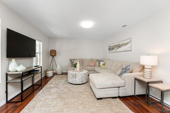 Living room with queen sleeper sectional sofa