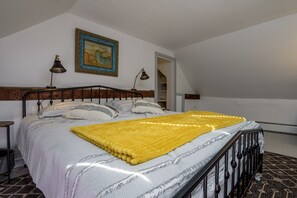 Master bedroom on 2nd floor with a king size bed