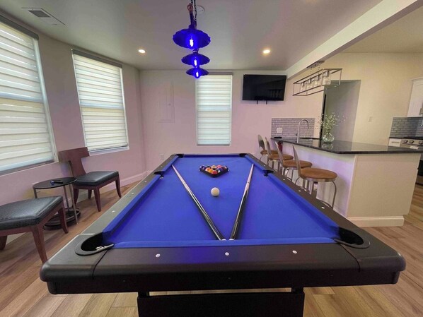 Centrally-Located Pool Table Area featuring Seating for 2