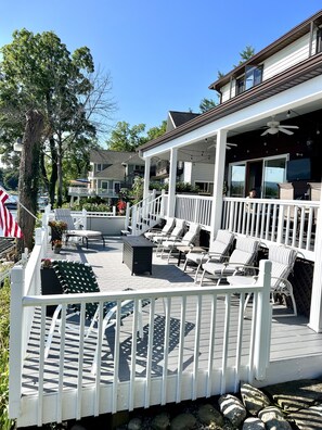 This is the lower deck.  Perfect for chatting, enjoying views, & having a fire.
