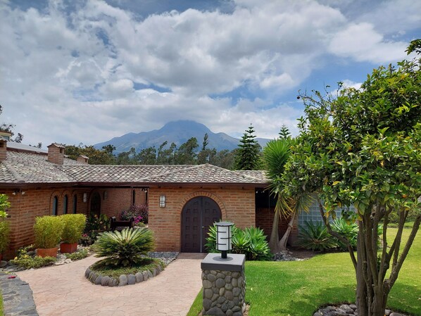 Entry to the house with volcano Imbabura in the background.