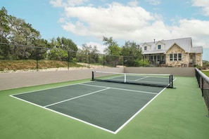 Pickleball court (pickleball rackets and balls are provided).