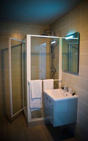 Freshen up in the bathroom after a day of adventure.