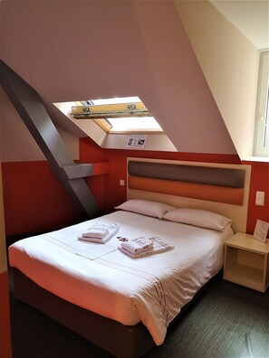Relax on the comfy bed after a day outside.