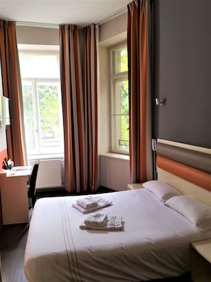 Relax on the comfy bed after a day outside.