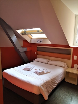 Get a peaceful night sleep in our cozy bedroom.