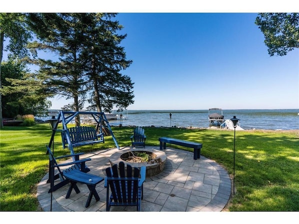 Plentiful seating, great views, fire pit and yard space and beach to enjoy.