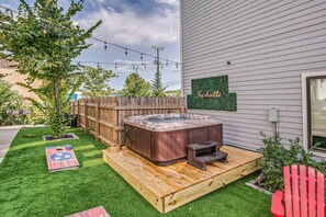 Our shared courtyard is unlike any other! Enjoy a hot tub, BBQ grills, patio furniture, and more!