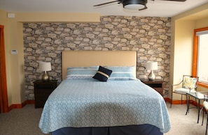 Large primary bedroom with ensuite and double closets.