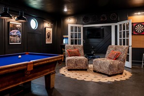 Our game room - the perfect spot to let loose and have some fun!