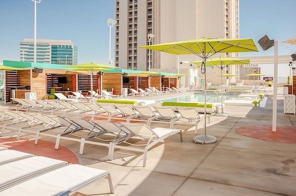 Outdoor pool, a heated pool, cabanas (surcharge), pool umbrellas
