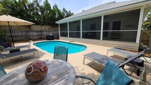 Pool has Outdoor Dining Table