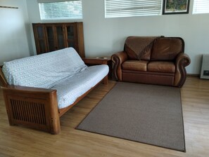 Waterfront Cabin - Living Room Equipped with Sofa Sleeper and 32-inch Smart TV.