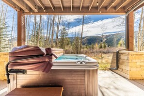 Private patio with hot tub.