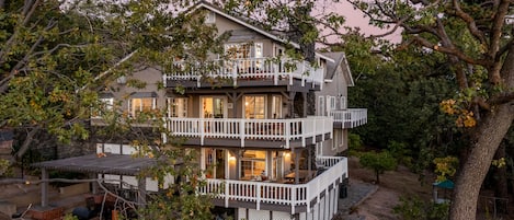 A huge home with multiple decks.