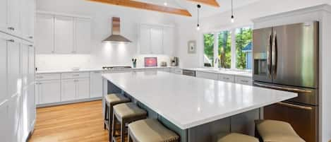 High ceilings appoint this chef`s dream kitchen