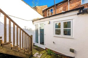 There is a small patio to the rear of the property.