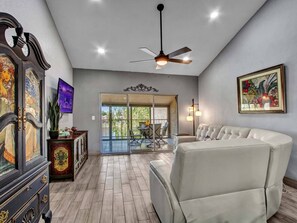 Beautiful living room with power couches and well appointed