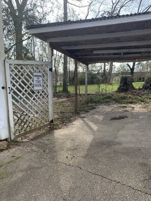 Please park here for the Nook . You can pull under shed . 