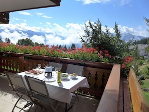 Cloud, Sky, Plant, Flower, Property, Table, Furniture, Flowerpot, Chair, Outdoor Furniture