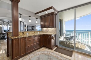 Kitchen workstation, overlooking stand-up bar, toward Dining Room and Greatroom.