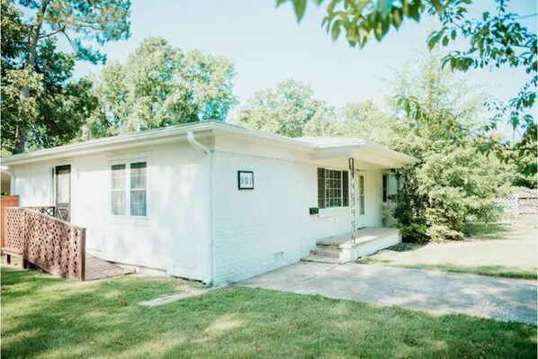 Exterior view with side wheelchair accessible ramp.