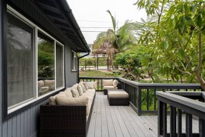 Feel the ocean breeze in the spacious outdoor patio equipped with plenty of seating