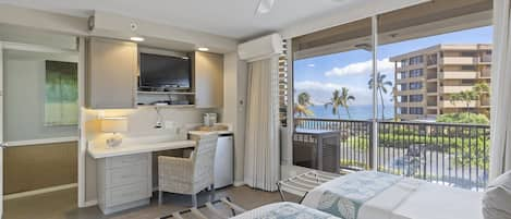 Bed can be one king or two single beds. 
 View of shared corridor, not a lanai. 