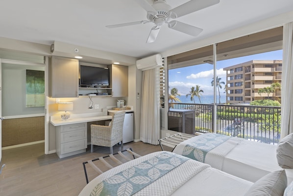 Bed can be one king or two single beds.
View of shared corridor, not a lanai.