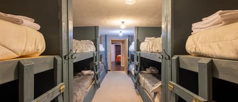 Our custom made bunk room! The bunks to the left are all doubles, for additional comfort.