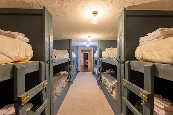 Our custom made bunk room! The bunks to the left are all doubles, for additional comfort.