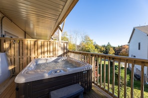 Enjoy the hot tub with peek-a-boo mountain views after a day of biking, hiking, or skiing