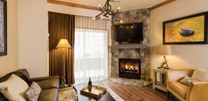 Main living room, queen sleeper/sofa with scenic patio or balcony.