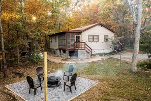 View of the house and fire pit area