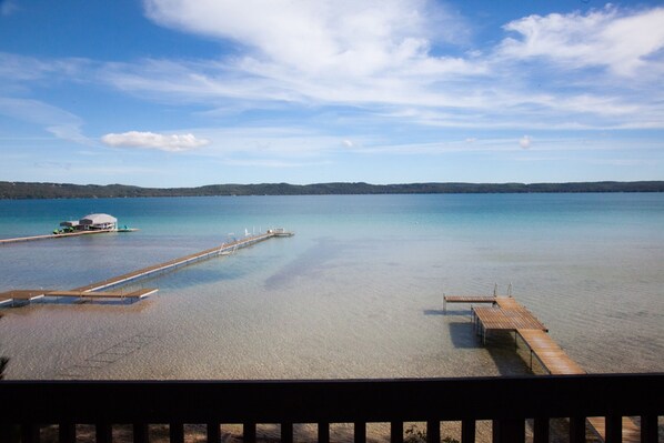 Wake up to views of the crystal clear lake from the deck
