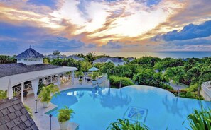 Club House pool, relaxation area and poolside dining