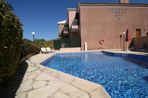 Open the garden gate and there is the pool!.