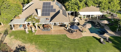 Aerial view of backyard/pool area.