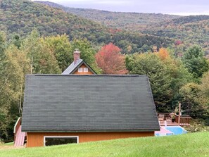 Closer view of house and surround.