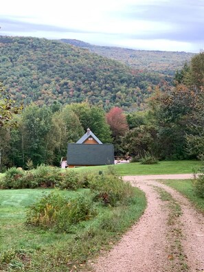 View from top of hill looking down at house